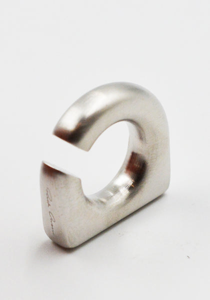 RICK OWENS MEN ROUND PRONG EAR CUFF PALLADIO FW25 | DOSHABURI Shop