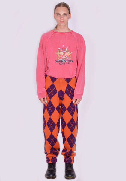 LIBERAL YOUTH MINISTRY ARLEQUIN KNITTED PANTS PURPLE/ORANGE FW23 | DOSHABURI Online Shop